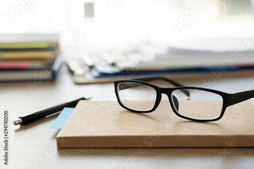 business man Office employee working contract with documents Stacks of Files paper and law