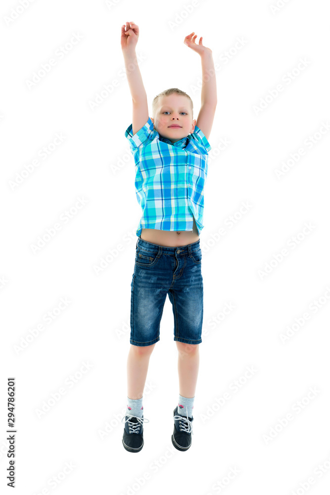 Little boy jumping.The concept of a happy childhood, sports and Little boy jumping.The concept of a happy childhood, sports and
