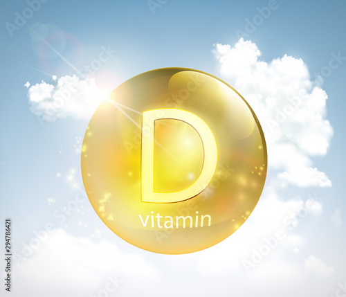 Pill vitamin D against the sky with the sun and clouds photo