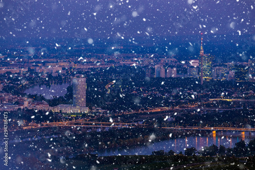 Photography Snowing in Vienna. City seen from Kahlenberg at night.