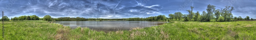 hdr panorama of a pond and landscape around