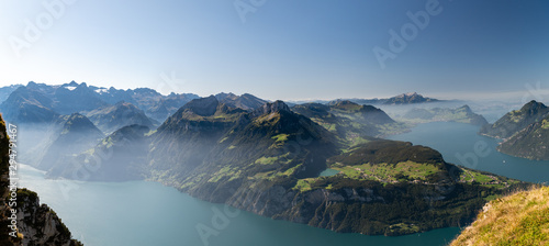 Panoramic view on Swiss Alps and on Lake Lucerne from Fronalpstock peak above the village of Stoos