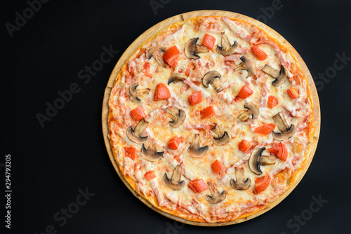 Pizza with mushrooms and ham