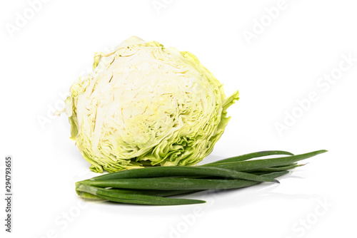 Fresh cabbage, carrot and onion isolated on white background. © Natallia