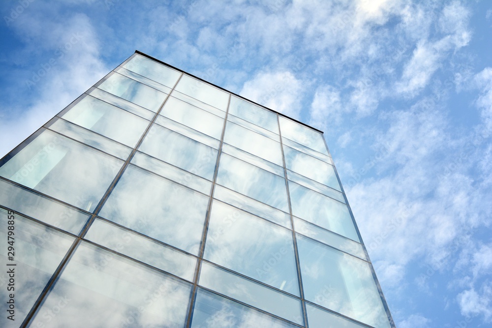 The windows of a modern building for offices. Business buildings architecture. The windows of a modern building for offices. Business buildings architecture.