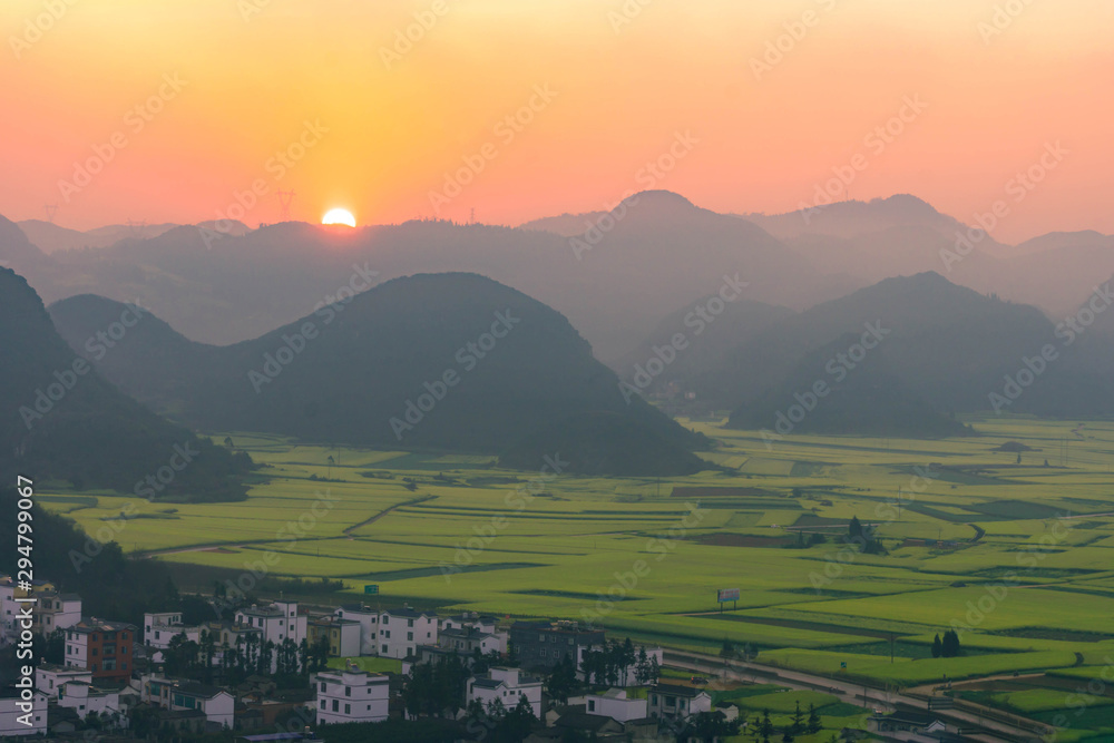 Small villages with Rapeseed flowers at Jinjifeng(Golden Chicken Peak), China
