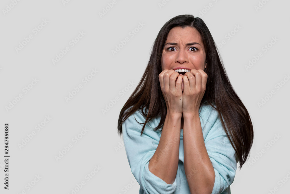 Female suffering from paranoia, anxiety, mental illness issues, inner critical voices and negativity from insecure thoughts Female suffering from paranoia, anxiety, mental illness issues, inner critical voices and negativity from insecure thoughts