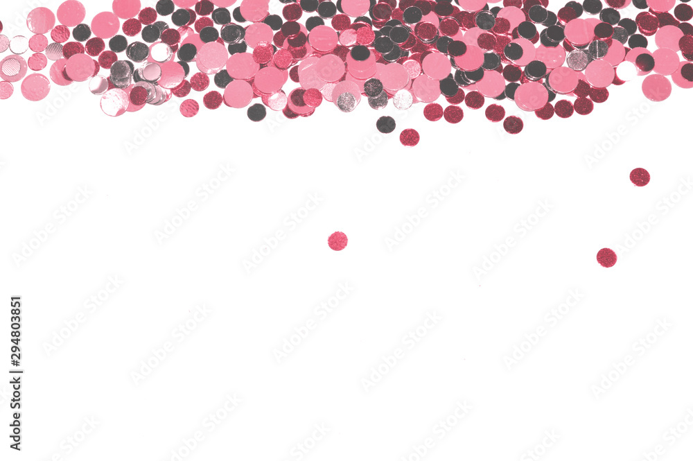 Silver and pink glitter on white background, shiny confetti