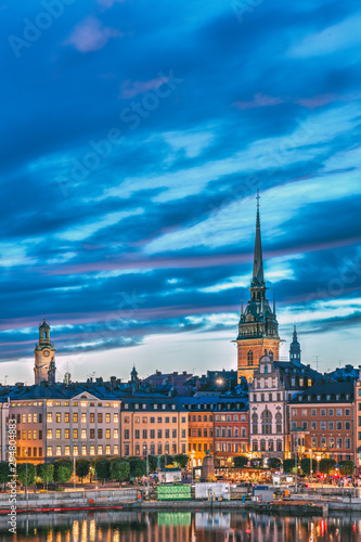 Stockholm, Sweden. Scenic View Of Skyline At Evening Night. Tower Of Storkyrkan - The Great Church Or Church Of St. Nicholas And German St Gertrude's Church. Famous Popular Destination In Night
