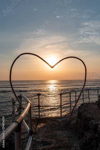 love shaped pipes and a sunset in bali photo