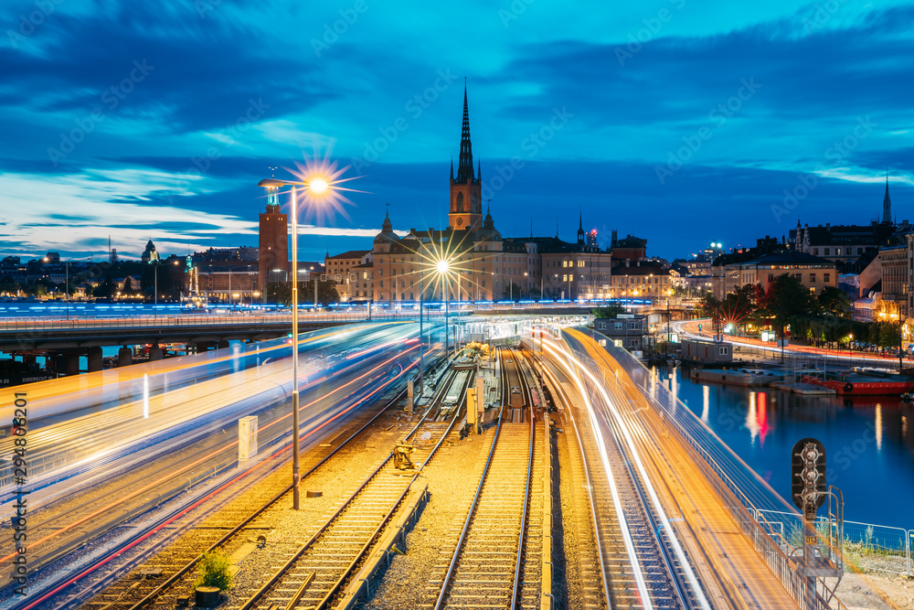 Stockholm, Sweden. Scenic View Of Stockholm Skyline At Summer Evening. Famous Popular Destination Scenic Place. Riddarholm Church And Subway Railway