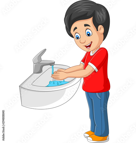 Little boy washing his hands on a white background