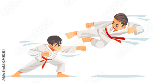 Two kids sparing on karate, makes a high kick.