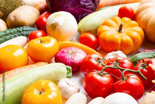 Assortment of fresh vegetables as a background. Seasonal close up farmer table with vegetables.