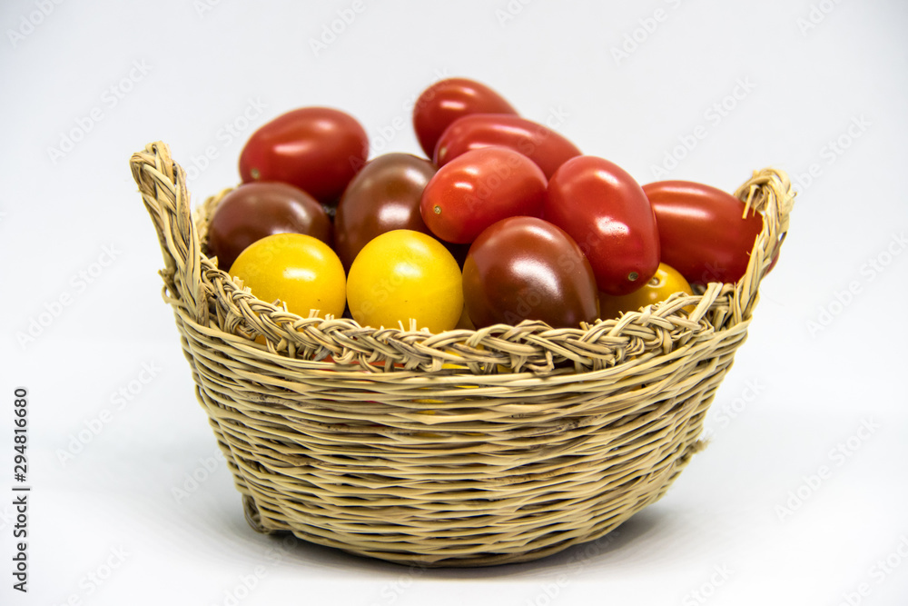 Fresh and colorful cherry tomatoes on white background Fresh and colorful cherry tomatoes on white background