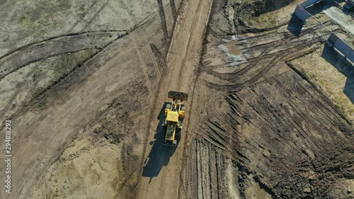 excavator in construction site aerial top view