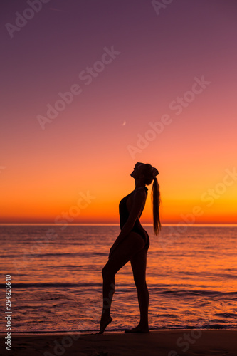 Blonde model on the sunset in Greece