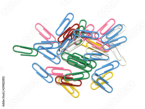Colored paper clips on white background