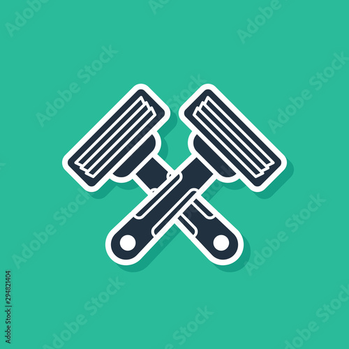 Blue Crossed shaving razor icon isolated on green background. Vector Illustration