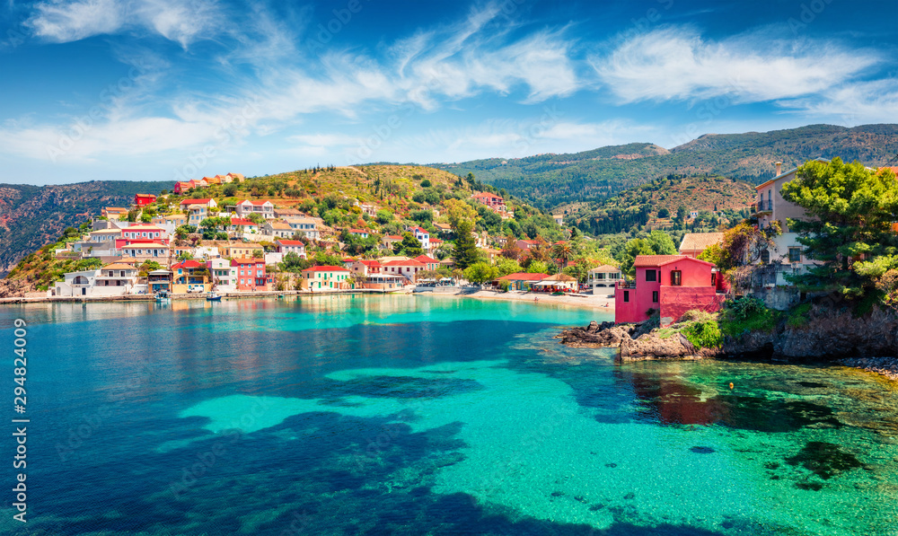 Colorful morning cityscape of Asos village on the west coast of the island of Cephalonia, Greece, Europe. Amazing spring sescape of Ionian Sea. Traveling concept background.