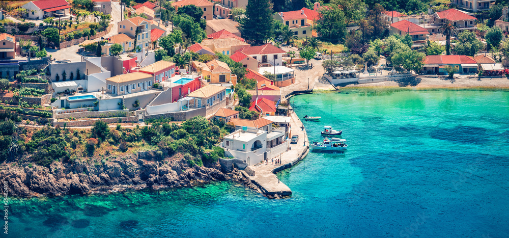 Aerial view of the Asos village from the Venetian Castle Ruins. Panoramic spring seascape of Ionian Sea. Picturesque outdoor scene of Kefalonia island, Greece, Europe. Traveling concept background.