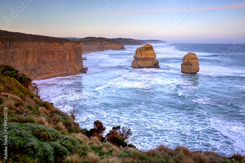 Soft light at sunset on the sea stacks and cliffs of The Twelve Apostles on Victoria's Great Ocean Road.