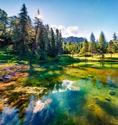 Gorgeous morning view of small mountain lake - Scin. Stunning summer scene of Dolomiti Alps, Cortina d'Ampezzo, Province of Belluno, Italy, Europe. Beauty of nature concept background.