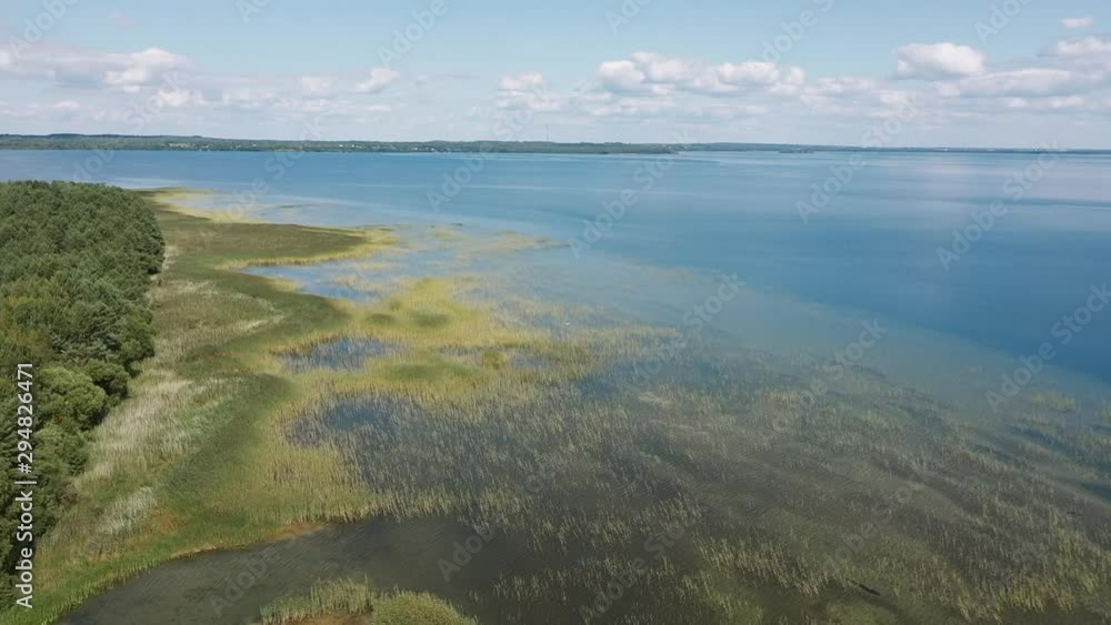 Aerial drone video over a natural shallow in the middle of the lake Aerial drone video over a natural shallow in the middle of the lake