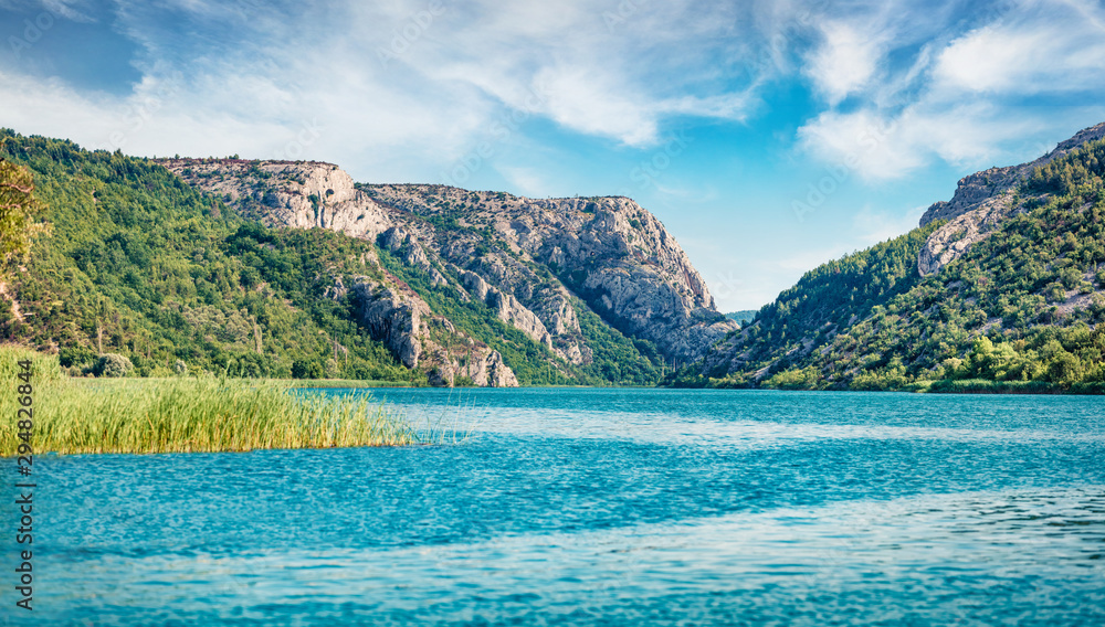 Panoramic summer view of Visovacko lake. Exciting morning scene of Krka National park, Roski Slap location, Croatia, Europe. Beautiful world of Mediterranean countries. Traveling concept background.