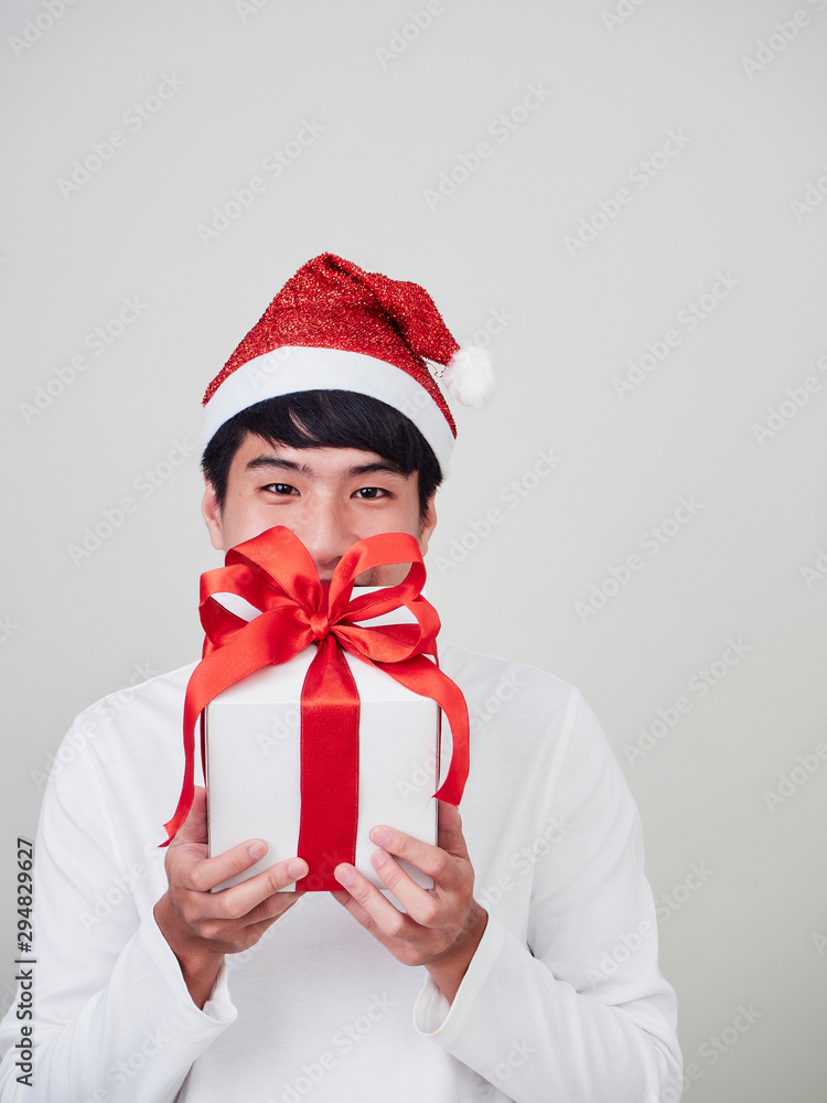 Young man with christmas gift box Young man with christmas gift box