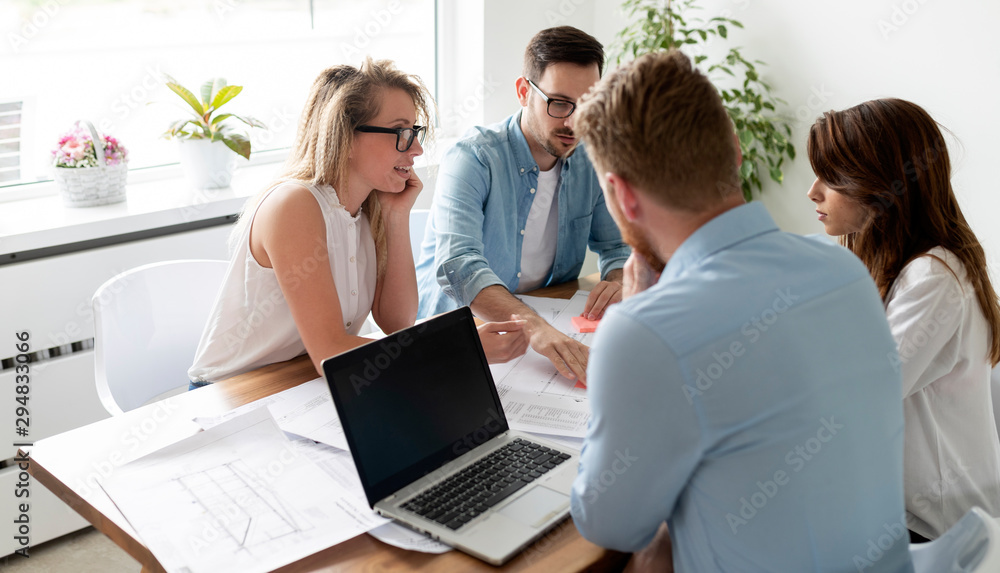 Business people working as a team at the office Business people working as a team at the office