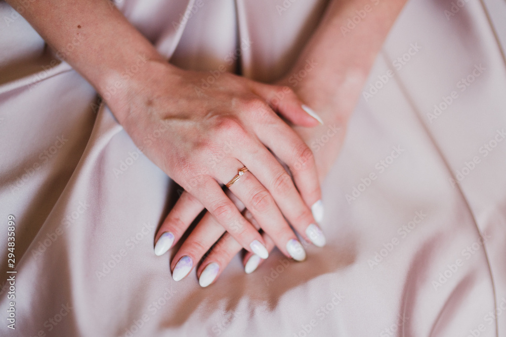 Modern bridal fashion. Closeup of engagement ring on bride's finger. Modern bridal fashion. Closeup of engagement ring on bride's finger.
