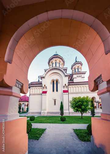 Marvelous summer view of Coronation Orthodox Cathedral in Fortress Of Alba Iulia. Picturesque evening scene of  Iulia Alba city, Transylvania, Romania, Europe. Traveling concept background. photo