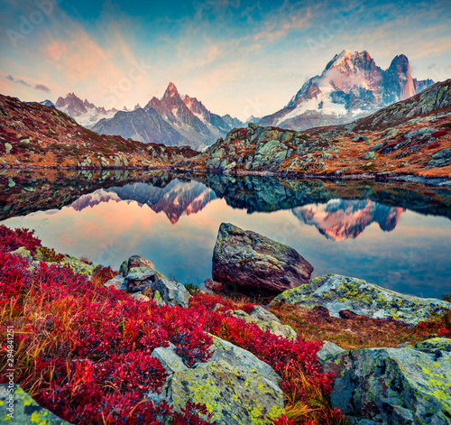 Captivating autumn view of Cheserys lake/Lac De Cheserys, Chamonix location. Stunning outdoor scene of Vallon de Berard Nature Preserve, Graian Alps, France, Europe.