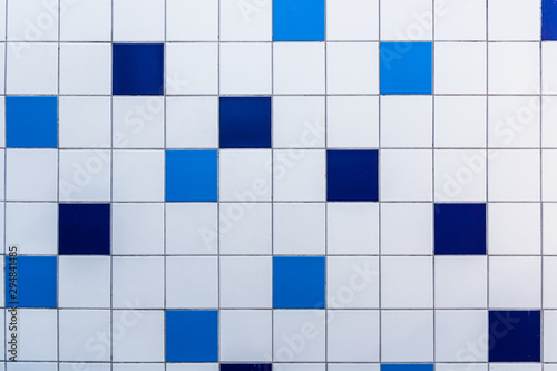 The mosaic of the blue and white ceramic tiles texture background