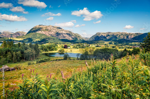 Typical countryside Norwegian landscape. Summy summer morning in Norway  Europe. Beauty of nature concept background. Artistic style post processed photo.