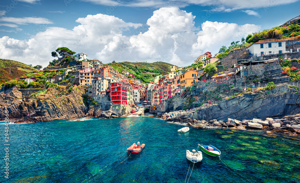 Sunny summer view of  Riomaggiore - Cique Terre sequence of hill cities. Wonderful morning view of Liguria, Italy, Europe. Splendid spring seascape of Mediterranean sea. Traveling concept background. - obrazy, fototapety, plakaty 