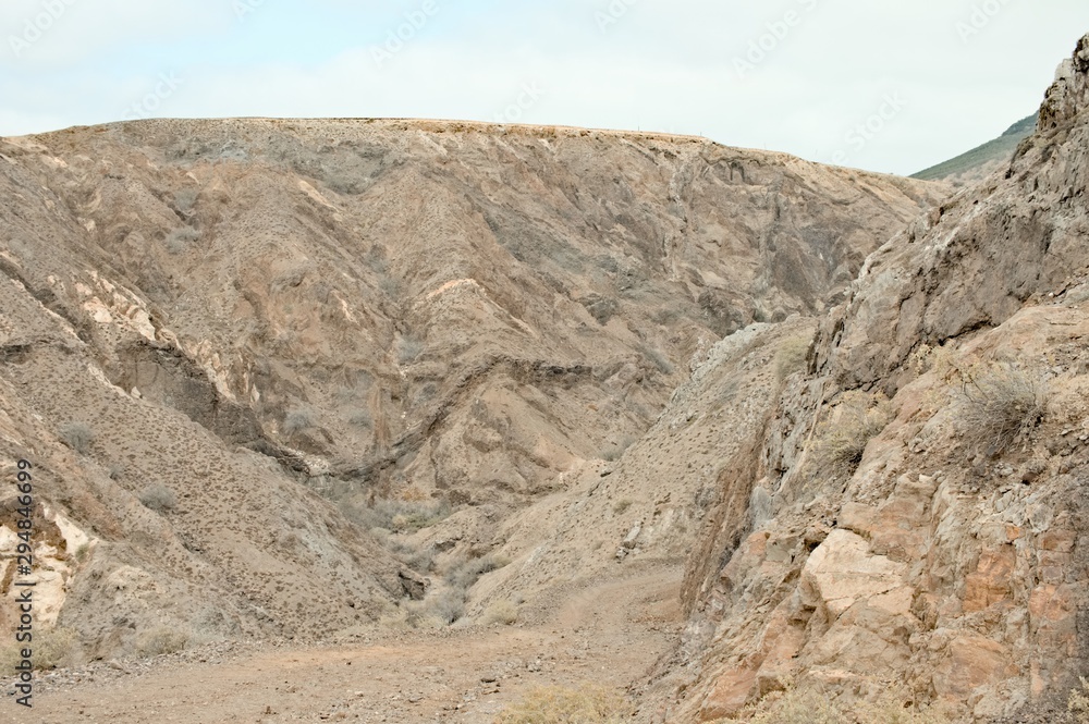Panoramic view of an arid canyon path in Porto Santo (Madeira Islands, Portugal)