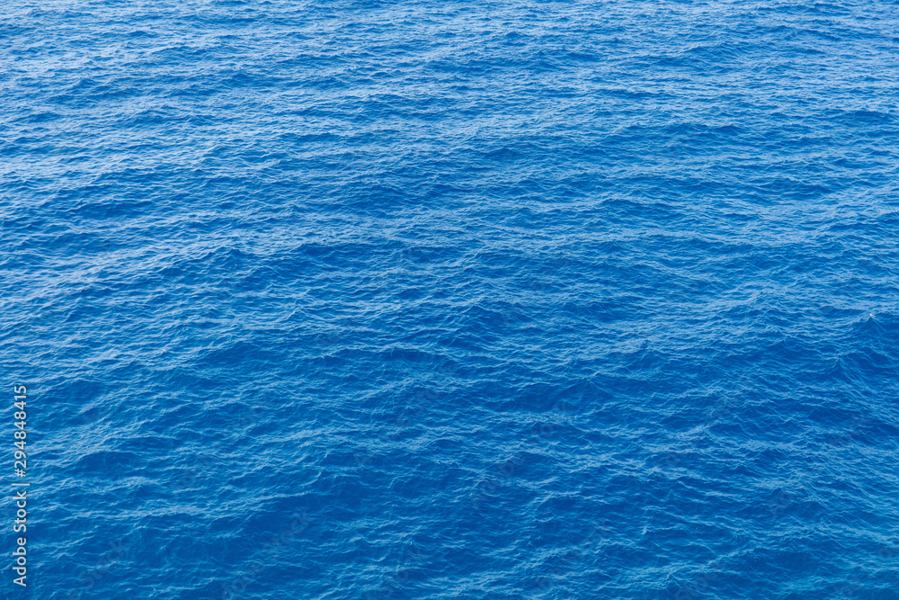 Obraz premium Blue sea surface with waves aerial view