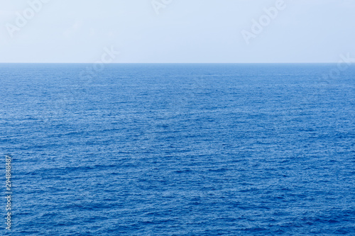 Blue sea surface with waves aerial view