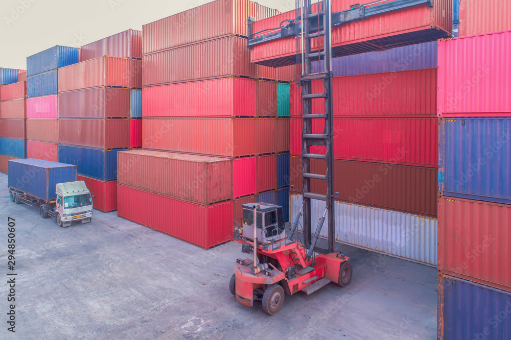 Industrial port crane lift up loading export containers box onboard ...