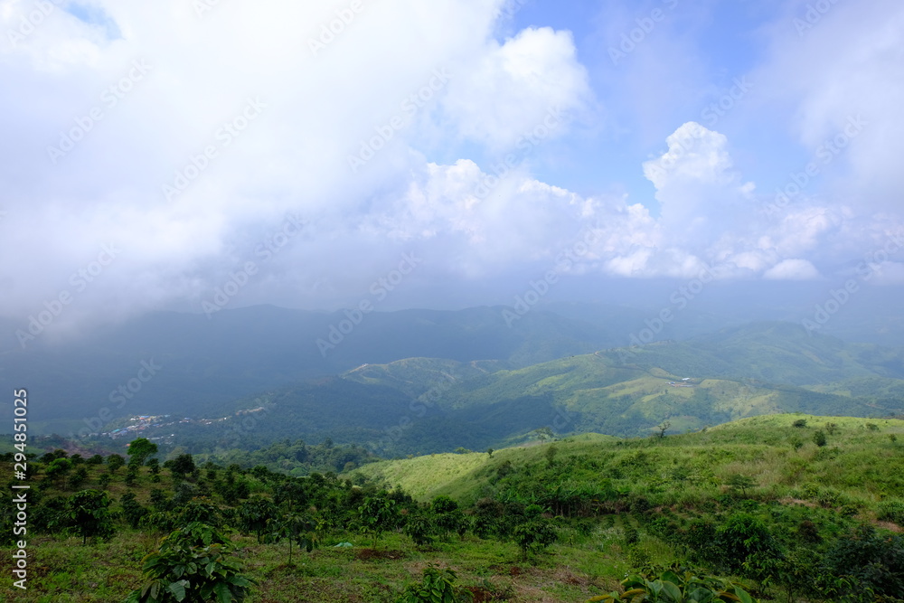 Naklejka premium clouds over mountains