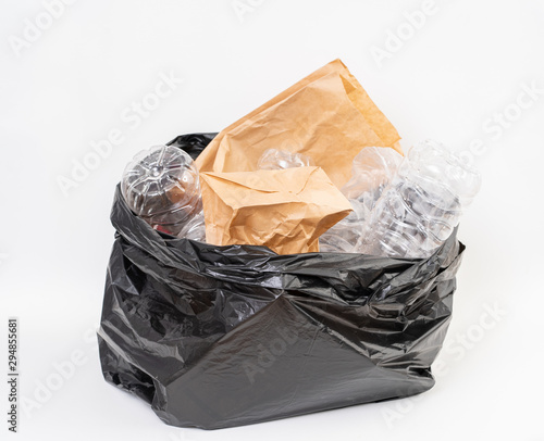 Trash bag with recycle garbage on white background