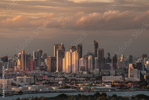 Beautiful view of Bangkok city, Beauty skyscrapers along Chaopraya river in the evening, making the city modern style. Copy area.