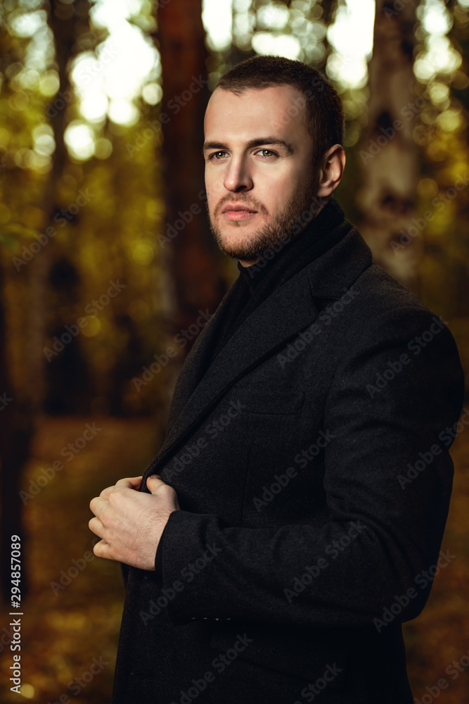 man in classical black coat man in classical black coat