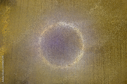 Background from a texture sheet of metal with reflection of a luminous circle. photo