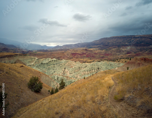 Breathtaking views of the grey-blue badlands and the John Day river valley from the Blue Basin Overlook Trail at the John Day Fossil Beds in Kimberly Oregon