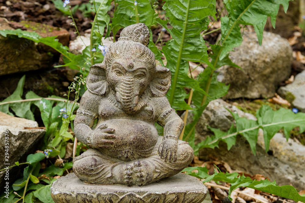 Lord Ganesh stone figure in a garden