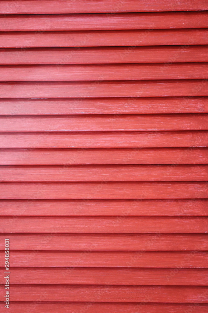 background of red wooden shutters background of red wooden shutters