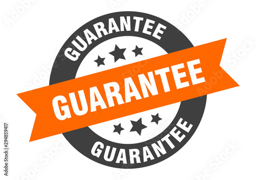 guarantee sign. guarantee orange-black round ribbon sticker photo